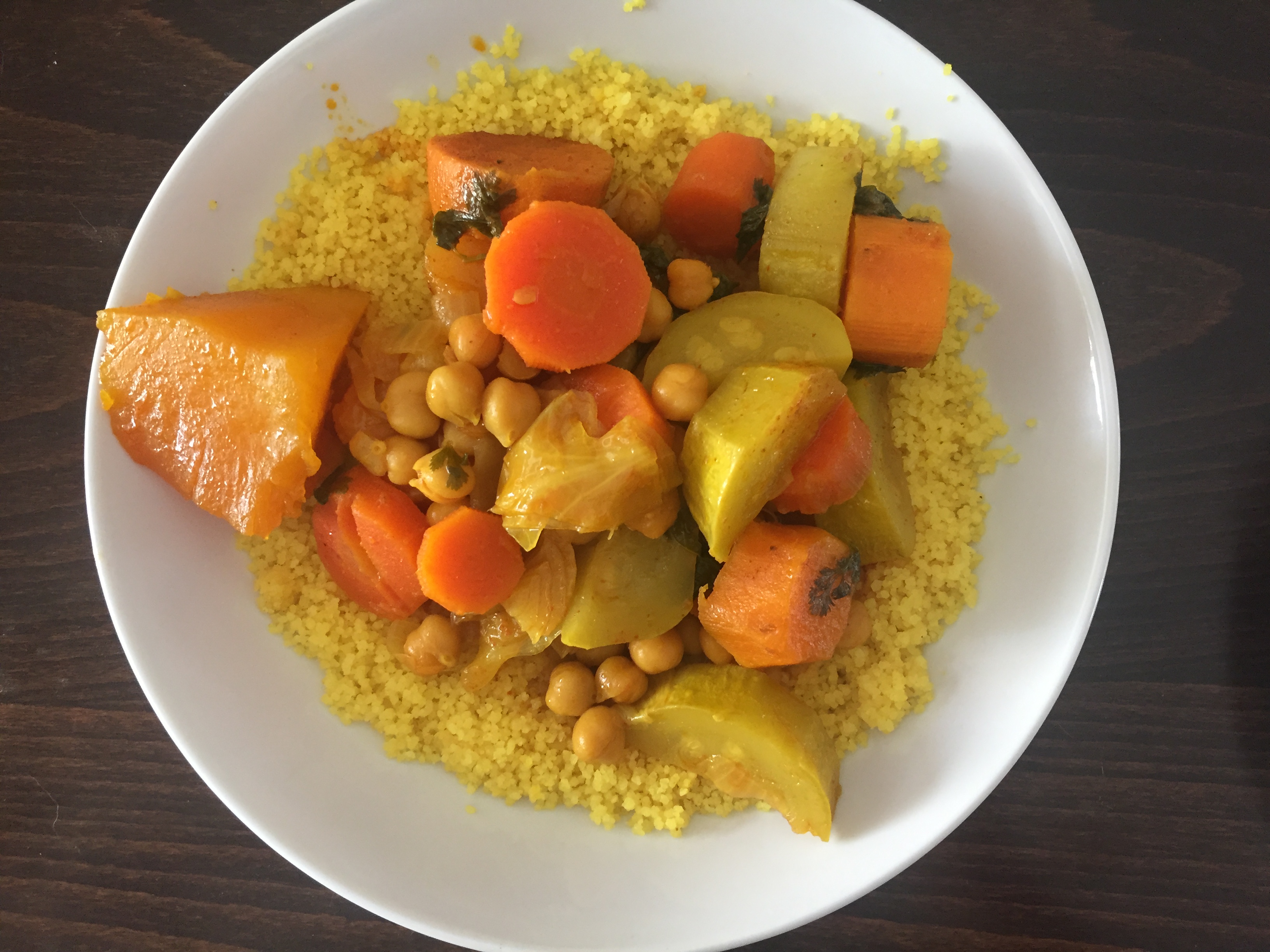 Vegetable couscous with carrots, pumpkin, zucchini and chickpeas; a serving suggestion.